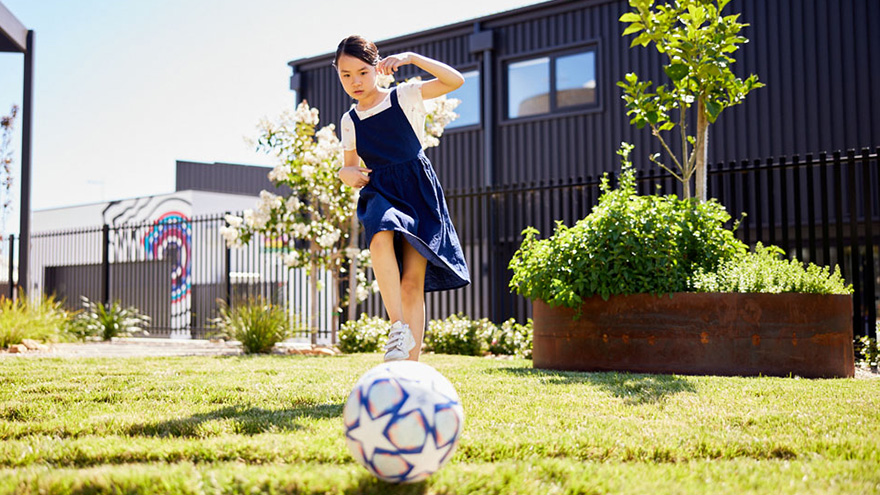 playing football in the backyard