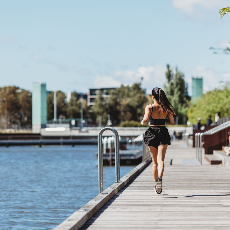 Student jogging along Kingston Foreshore